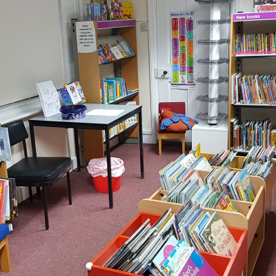 within childrens library window to front exterior
